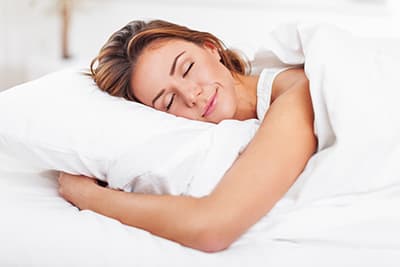 Woman sleeping happily